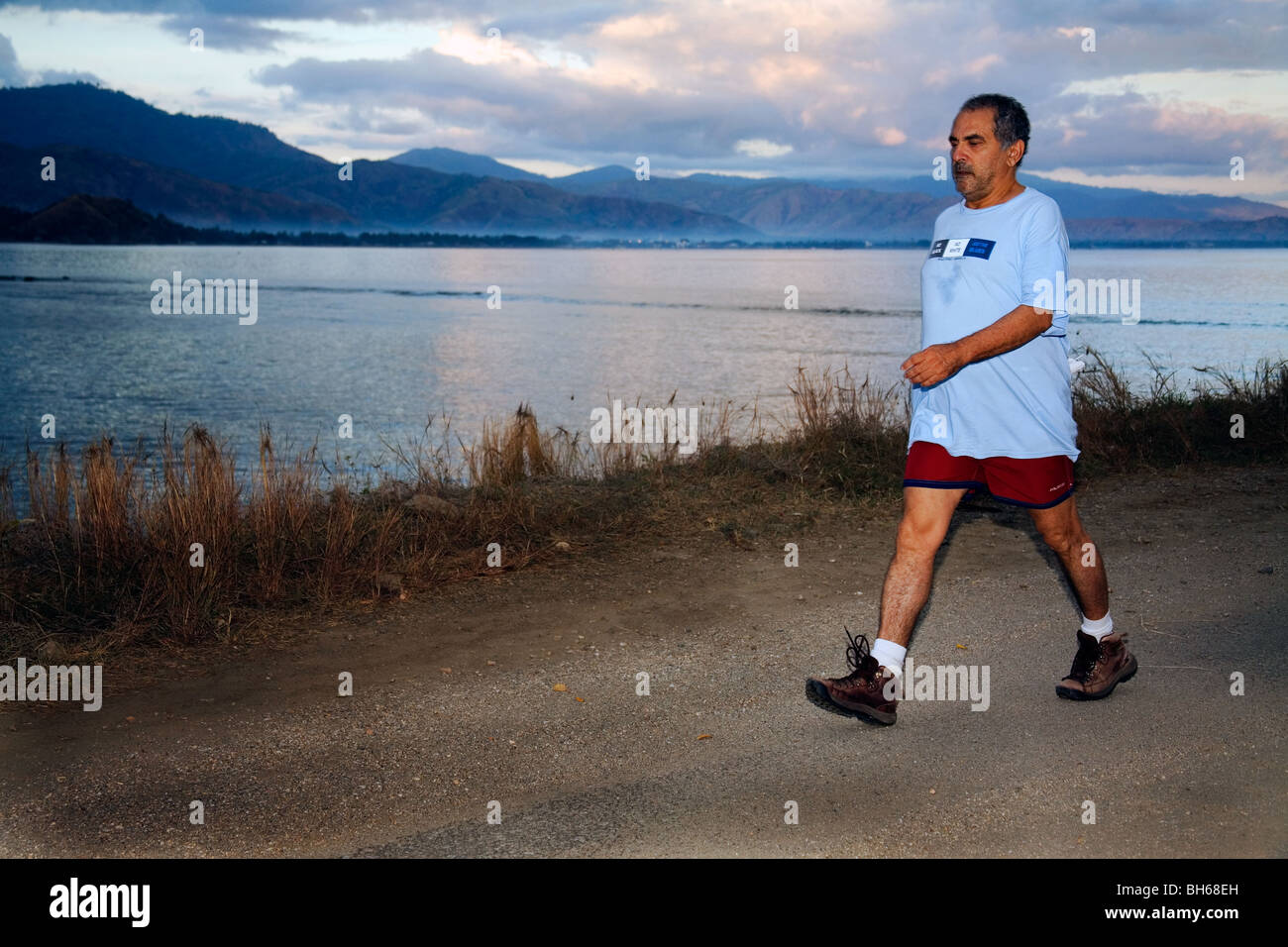 President of East Timor Jose Ramos-Horta exercises to keep-fit round Dili Bay every morning at dawn Stock Photo