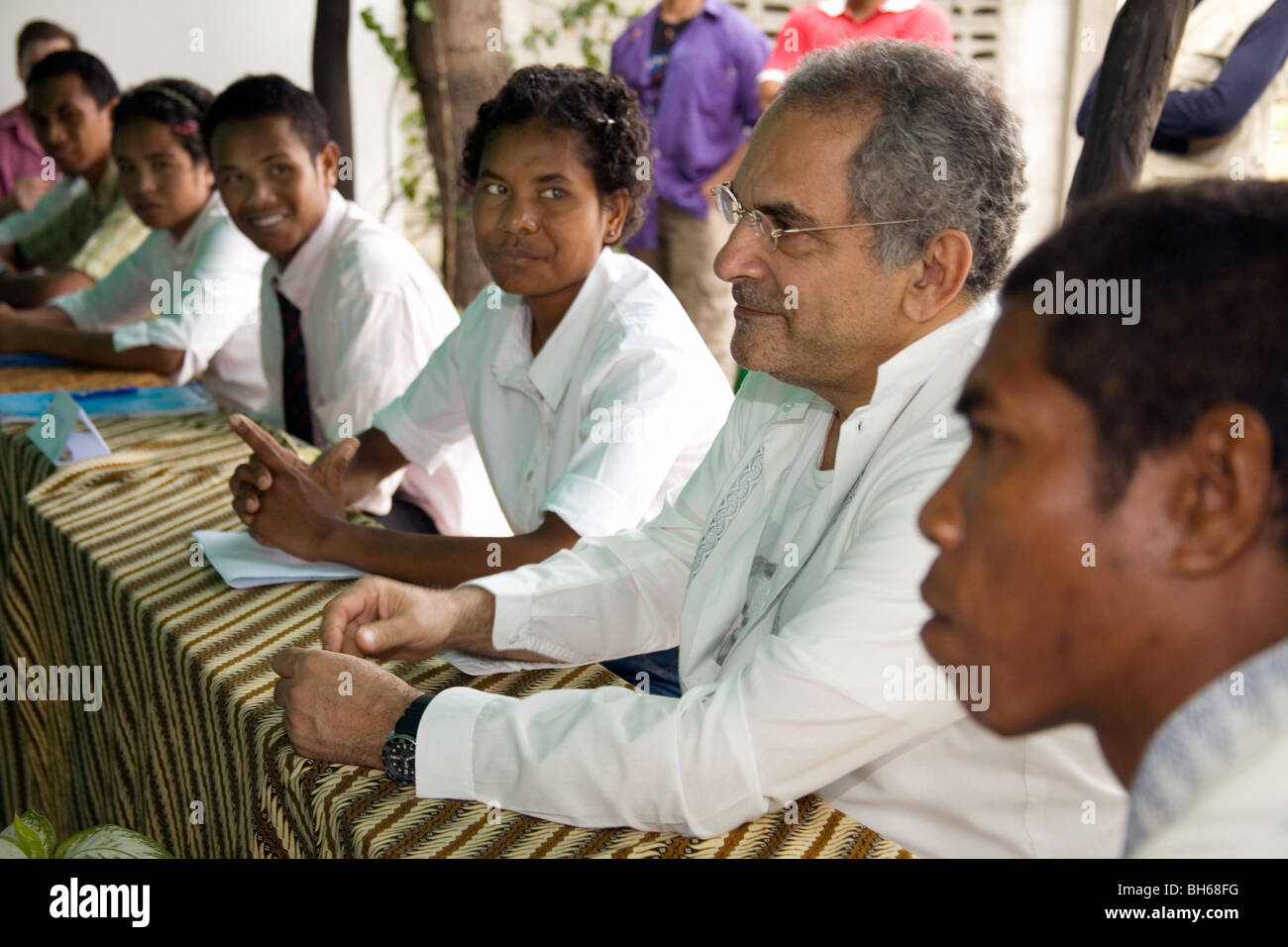 President of East Timor, Jose Ramos-Horta, 'man of the people' joins a class of students, Dili, August 2007 Stock Photo