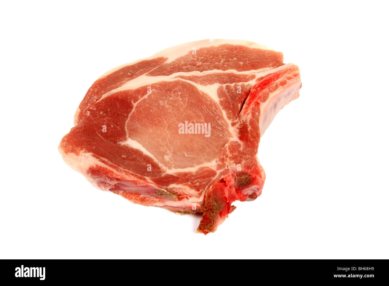 One Pork Loin chop against a white background Stock Photo