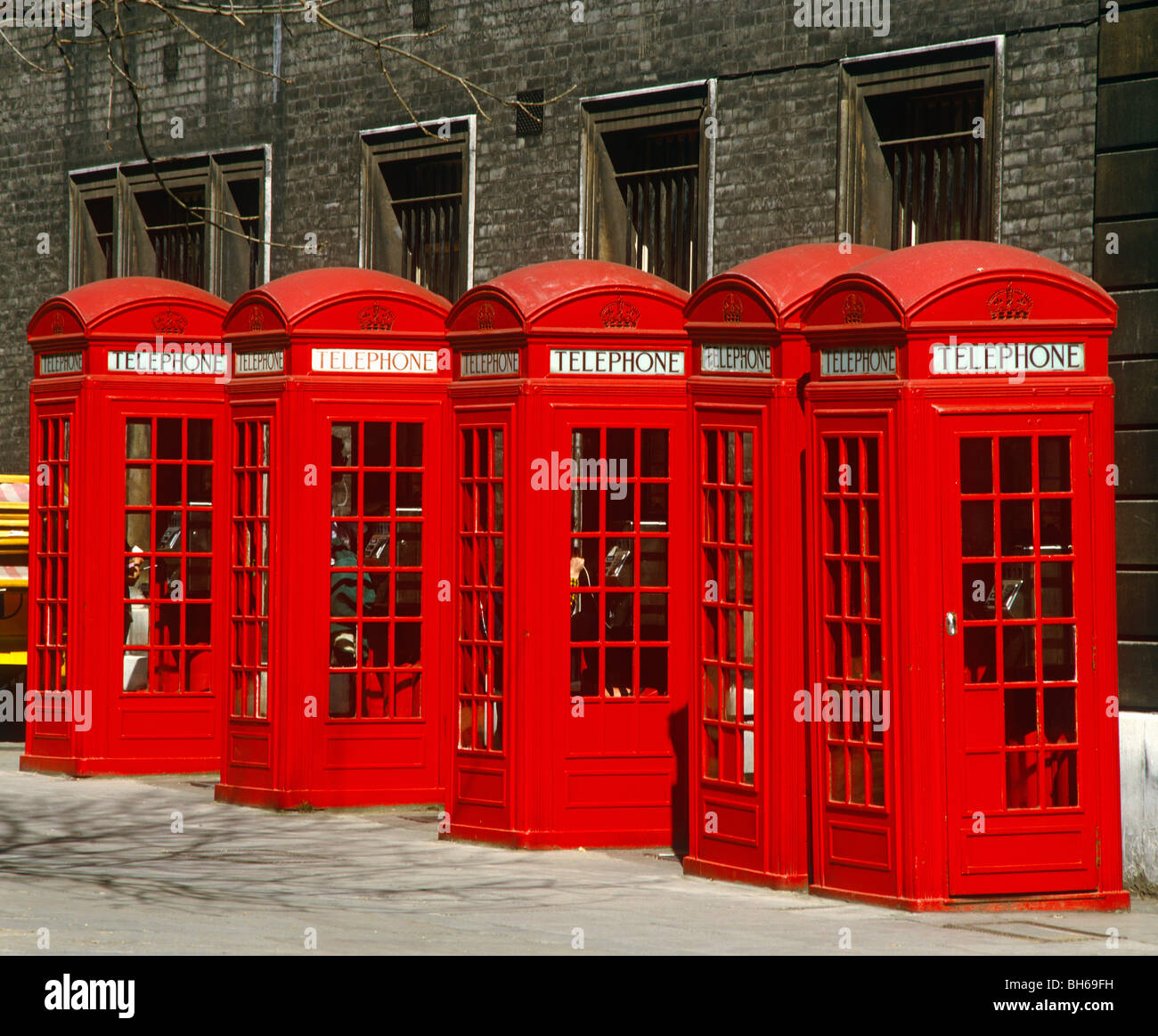 Row red telephone boxes, London, England Stock Photo Alamy