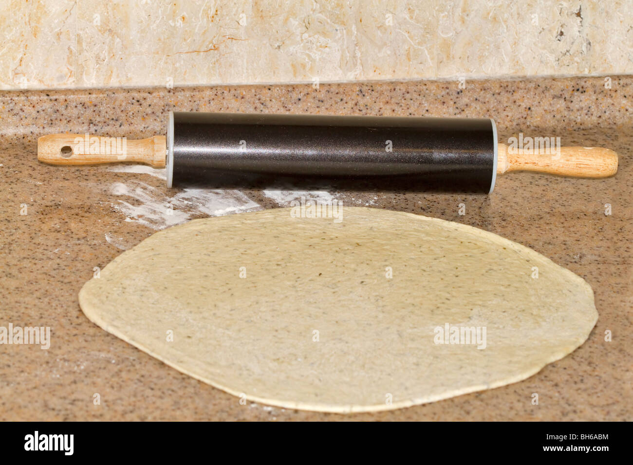 Pizza dough rolled out Stock Photo