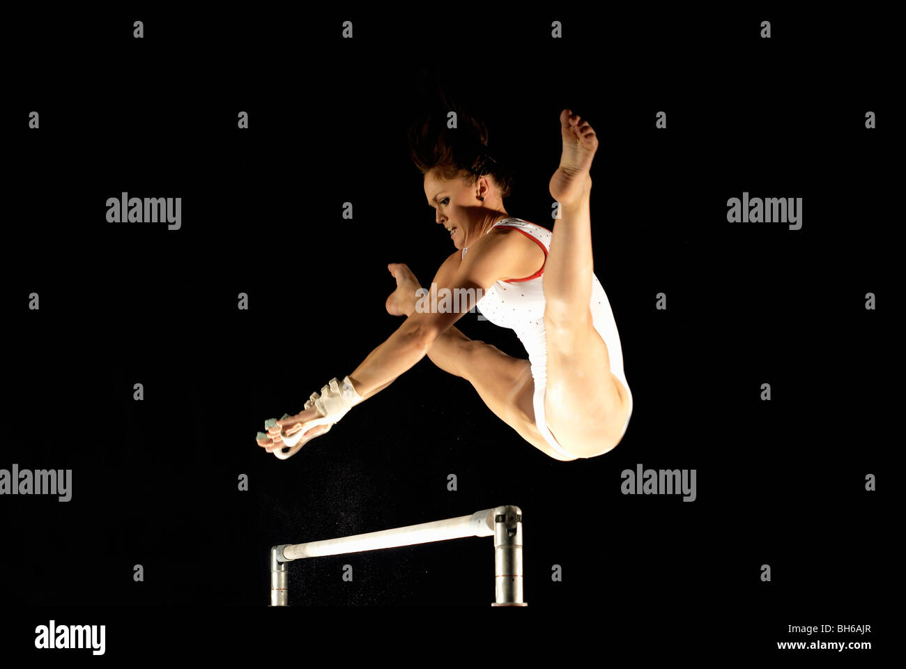 gymnast above high bars Stock Photo Alamy