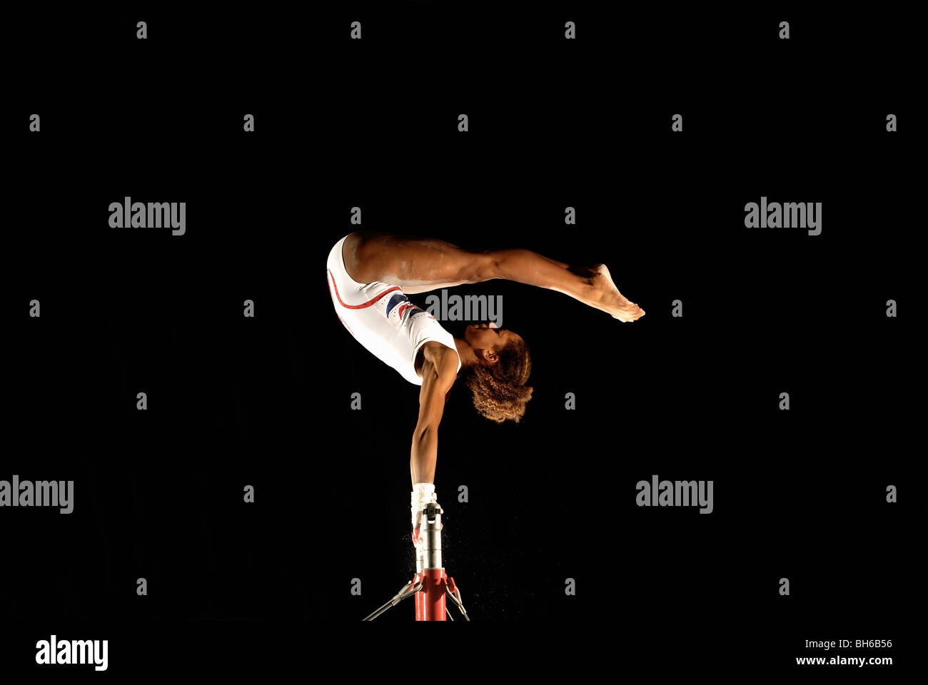 gymnast on high bars Stock Photo Alamy