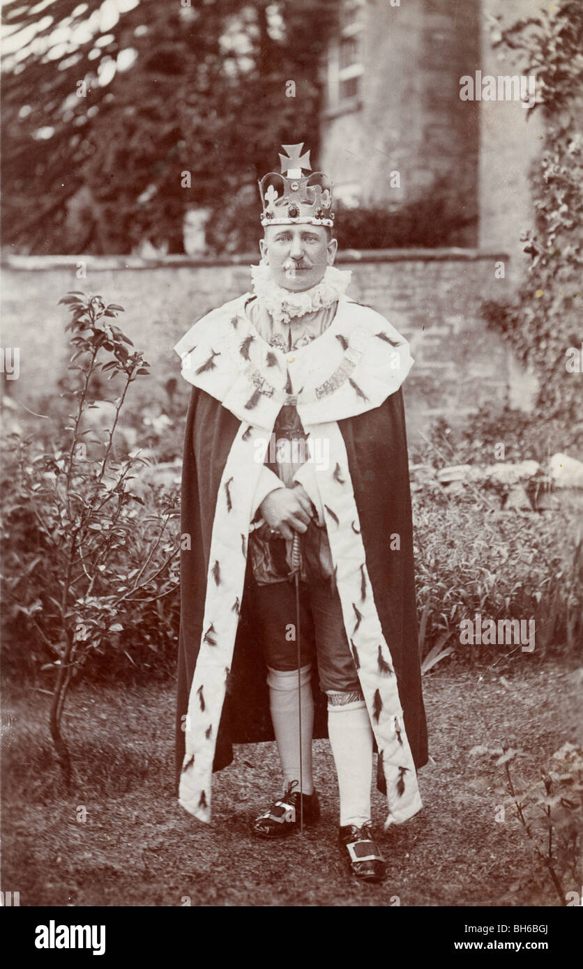 Man Dressed in Ermine Robe as a King Stock Photo