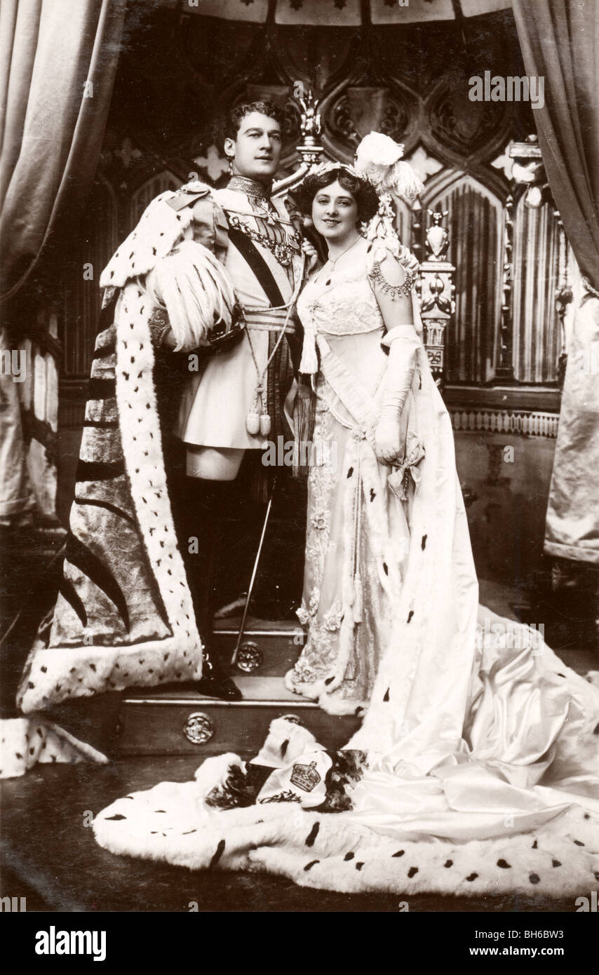 Regal King & Queen in Ermine Robes at Throne Stock Photo