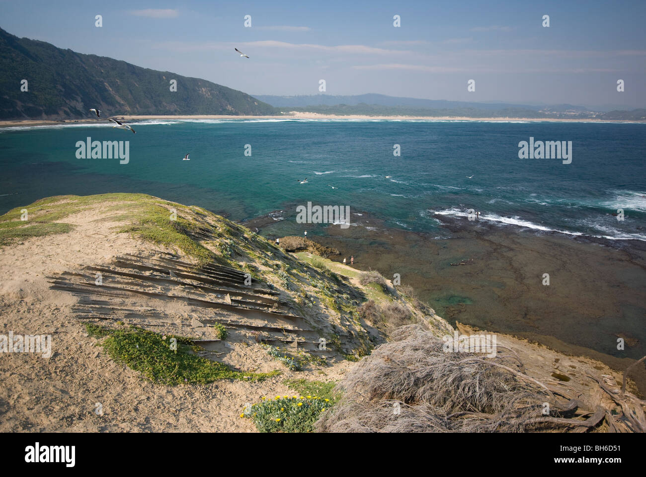 Layers of fossil dune are exposed by the wind on Gerickes Point in Wilderness, South Africa Stock Photo