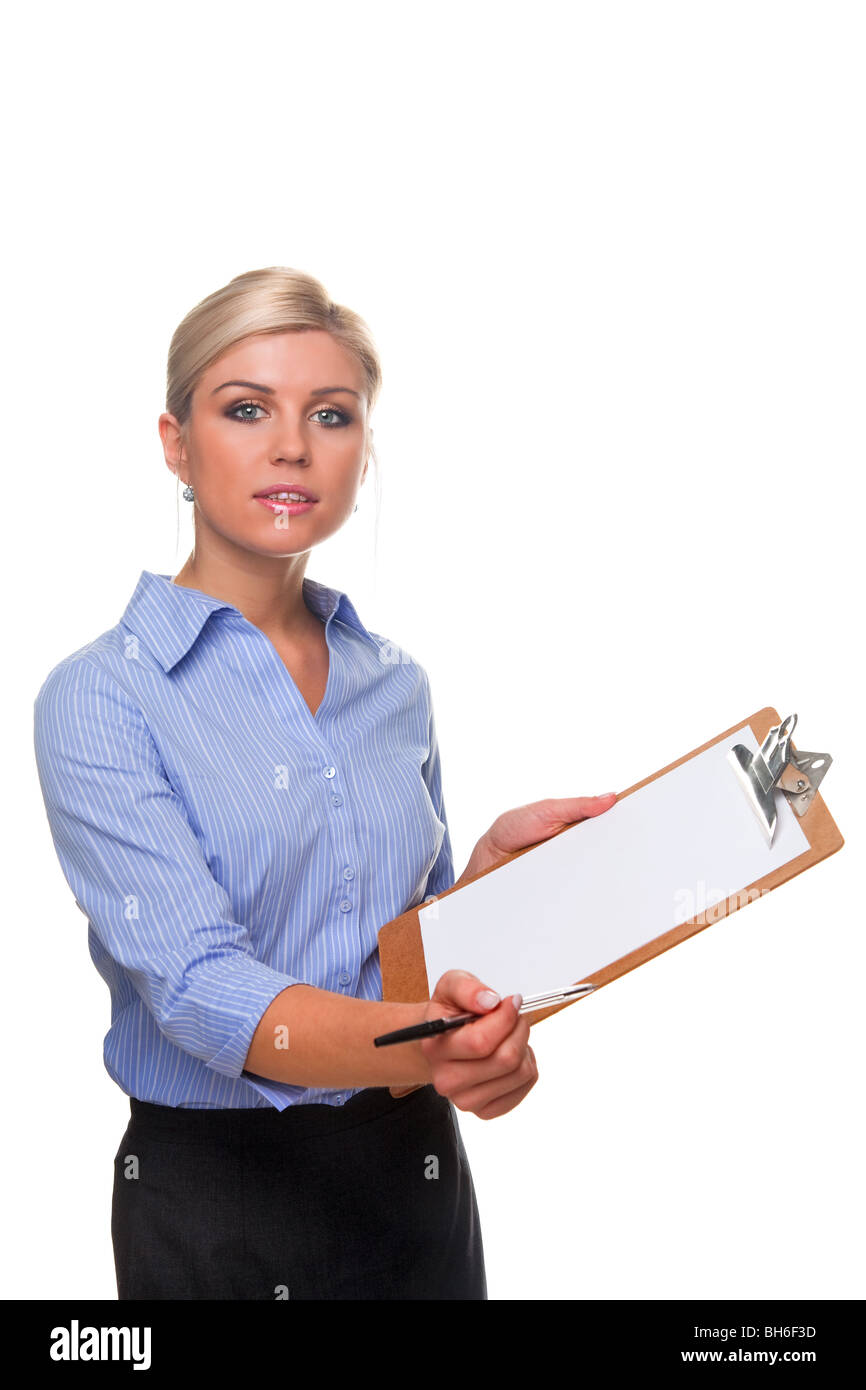 Blond woman holding a clipboard with blank paper on offering a pen, cut out white background. Stock Photo