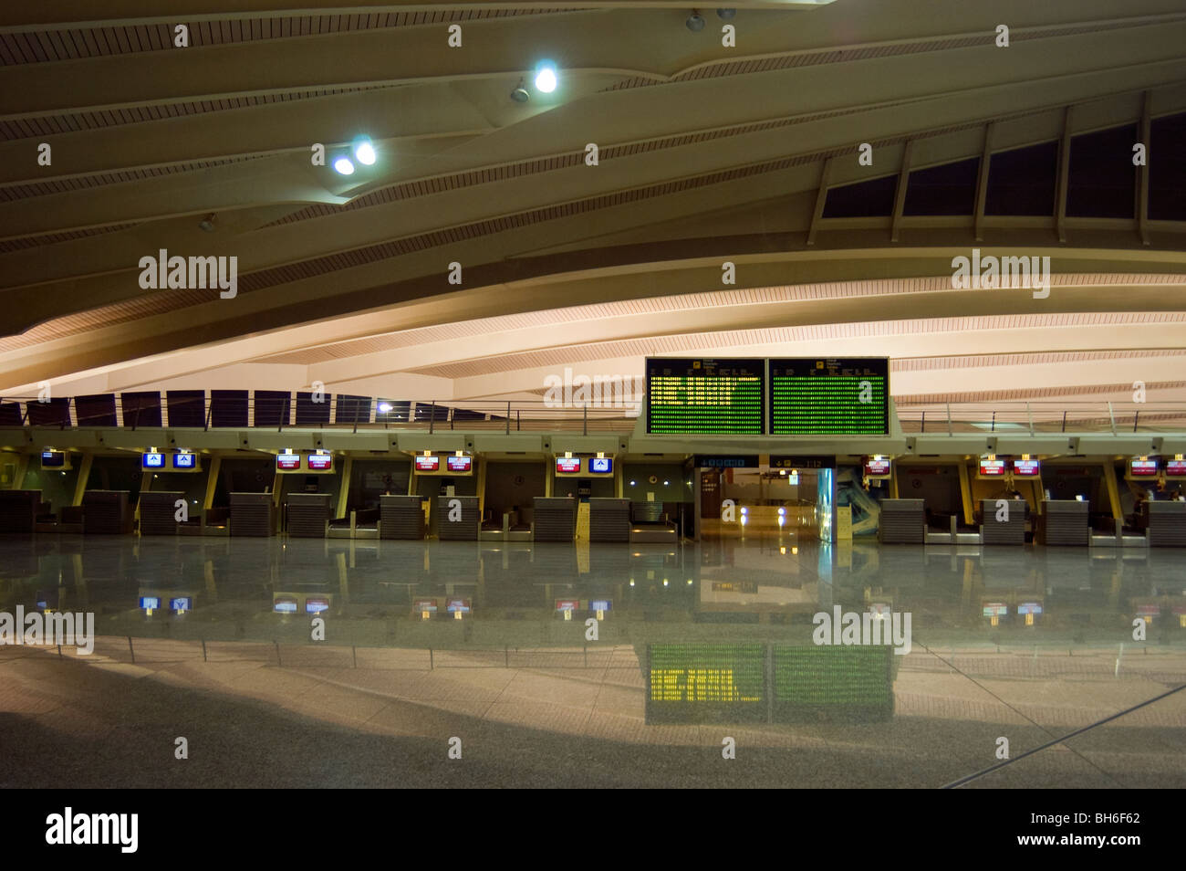An empty airport concourse with check-in desks.  Bilbao, Spain Stock Photo