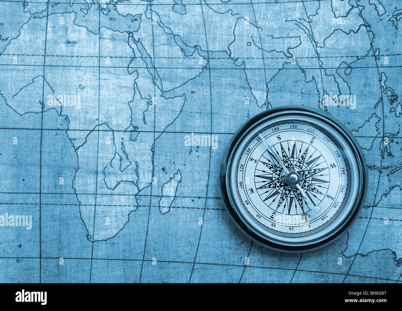 Compass and Chess on old map Stock Photo by ©kwanchaidp 75914583