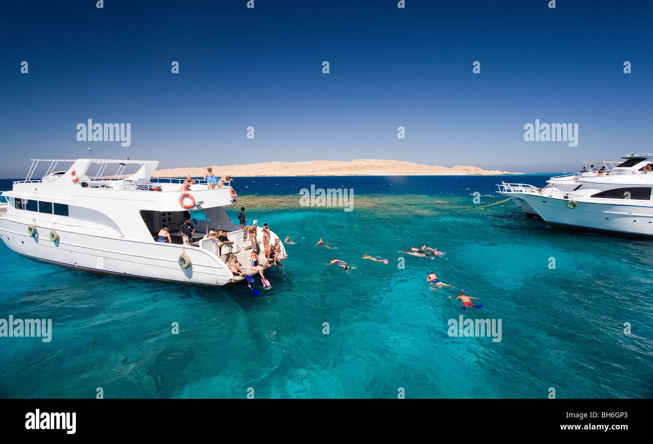 Tourist dive boats at sea Stock Photo