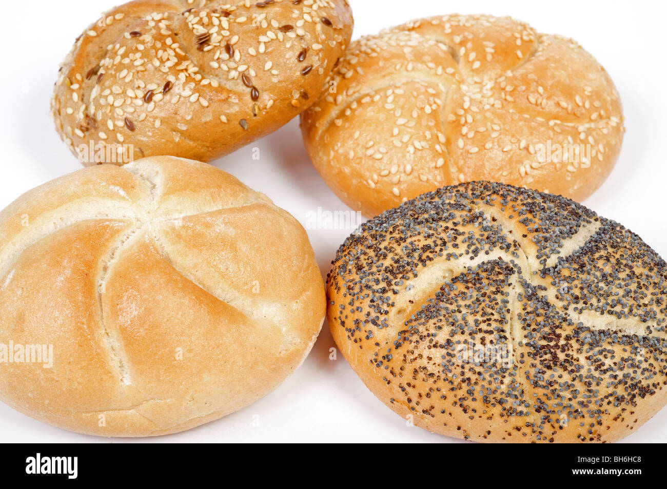 Kaiser or Vienna bread rolls sprinkled with poppy and sesame seeds