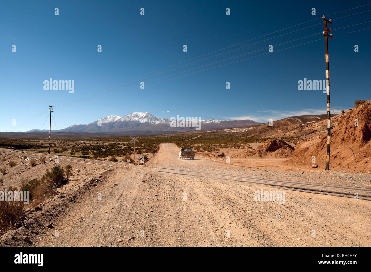 Tren a las Nubes - Train To the Clouds track + Snow capped mountain,  Province of Salta, Route 51, Argentina Stock Photo