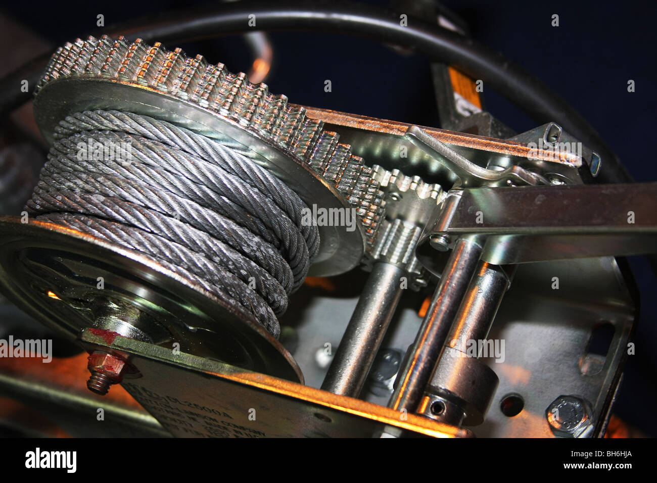 Close image of hand operated cable winch with gear and locking system. Stock Photo