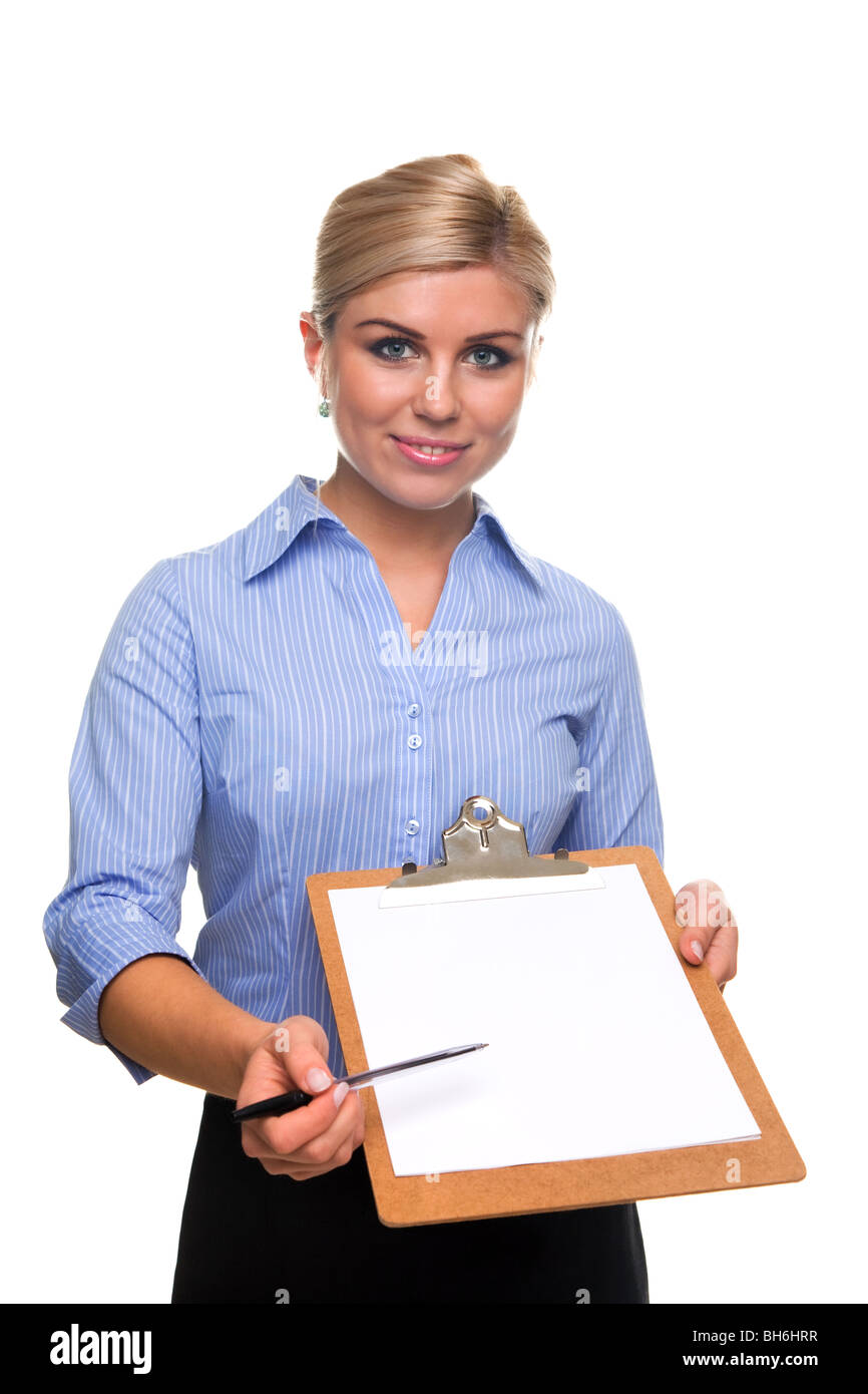 Blond woman holding a clipboard with blank paper on offering a pen, cut out white background. Stock Photo