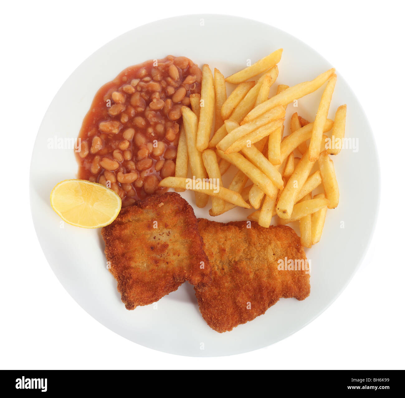 View looking down on a meal of fried breaded fish, with chips (french fries) and baked beans Stock Photo