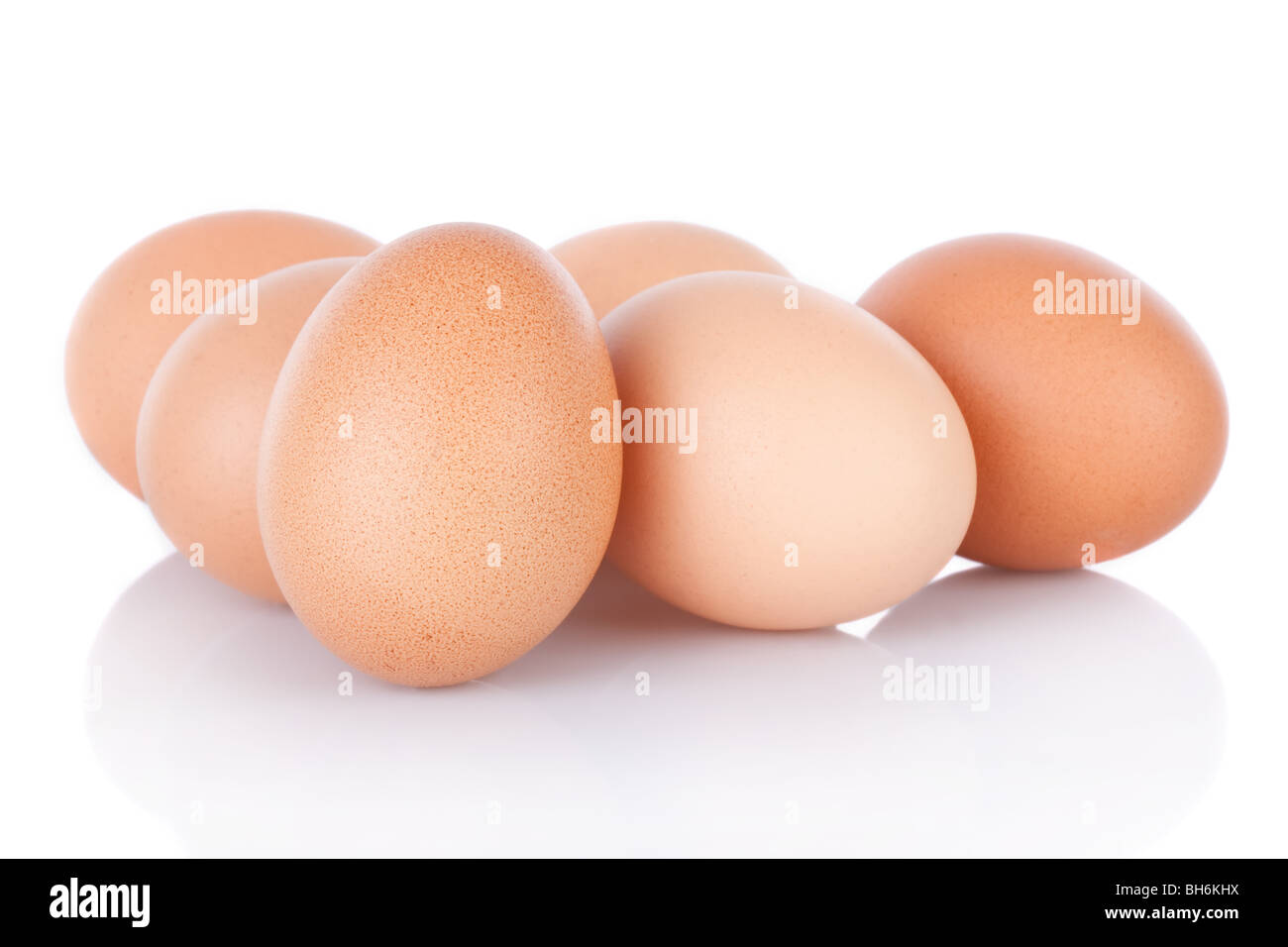 Half dozen  brown chicken eggs isolated on white background Stock Photo