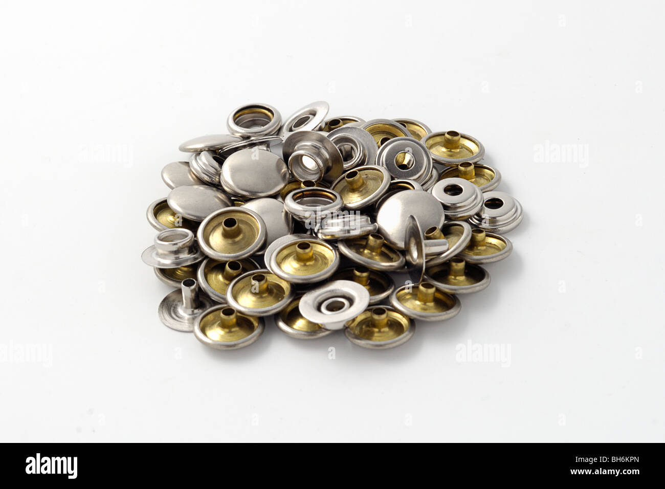 Press studs isolated on white Stock Photo - Alamy