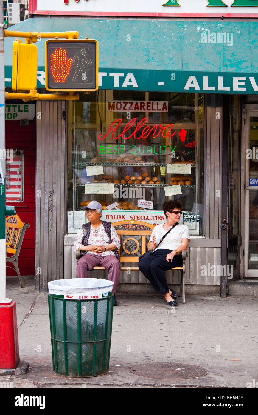 Tourist and Chinese American woman in Little Italy, NYC Stock Photo