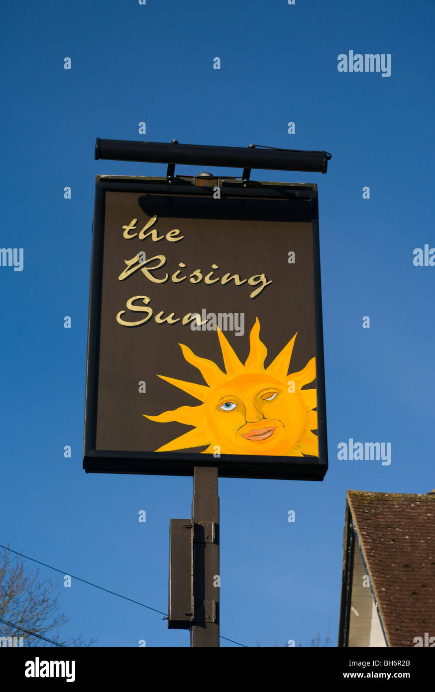 The Rising Sun Public House Sign Stock Photo - Alamy