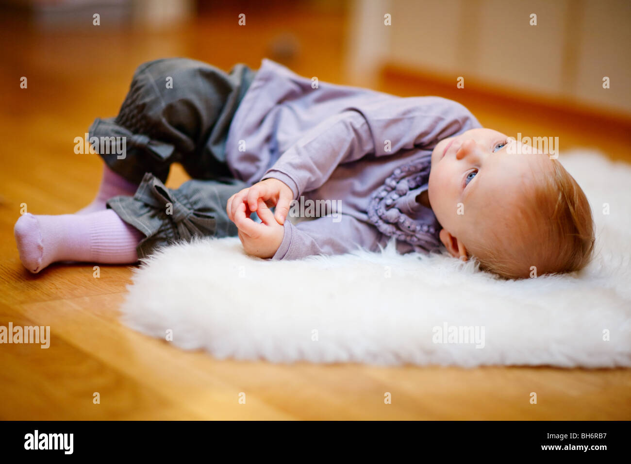 Portrait of adorable 15 months old baby girl in casual clothes Stock