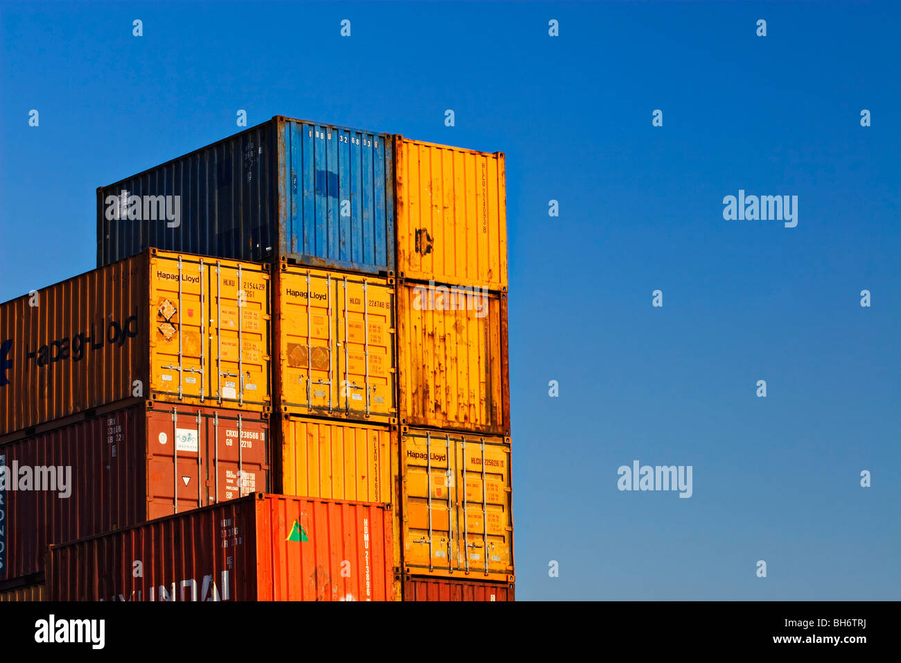Shipping industry / Shipping containers stacked high in the Port of