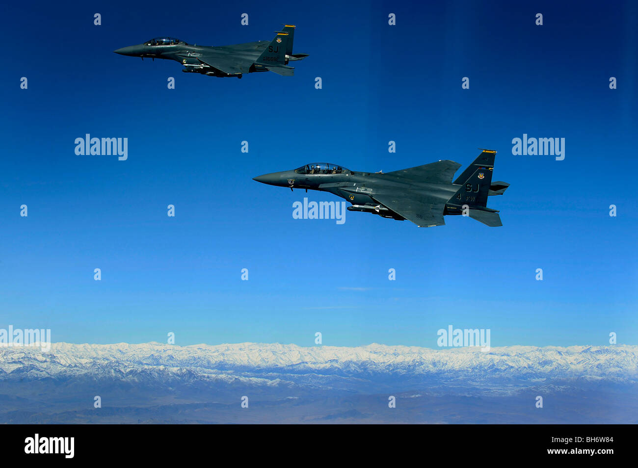 November 26, 2009 - Two U.S. Air Force F-15E Strike Eagles approach a mission objective in eastern Afghanistan. Stock Photo