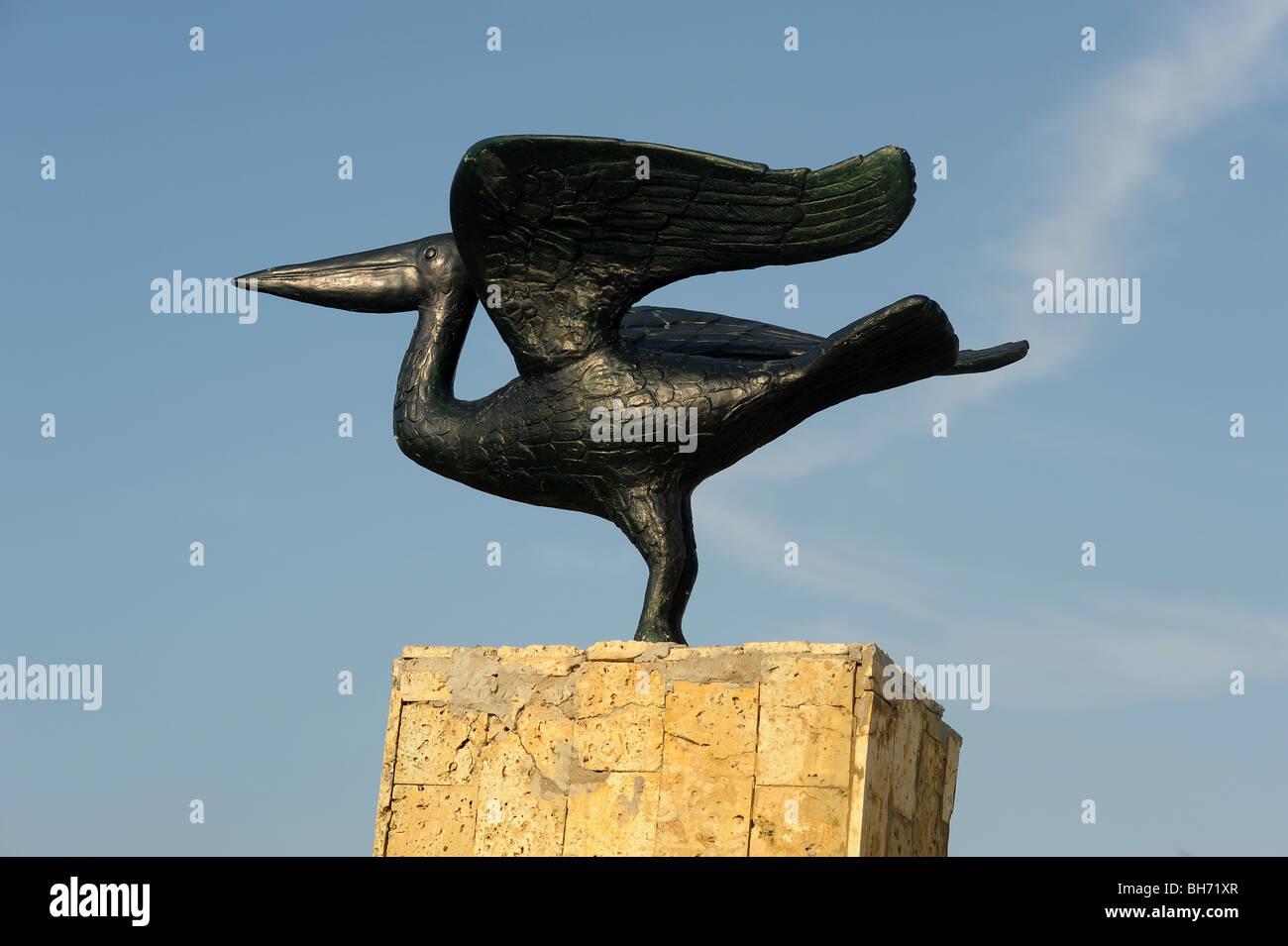 Pelican statue on plinth along Cartagena coast. Colombia South America. Stock Photo
