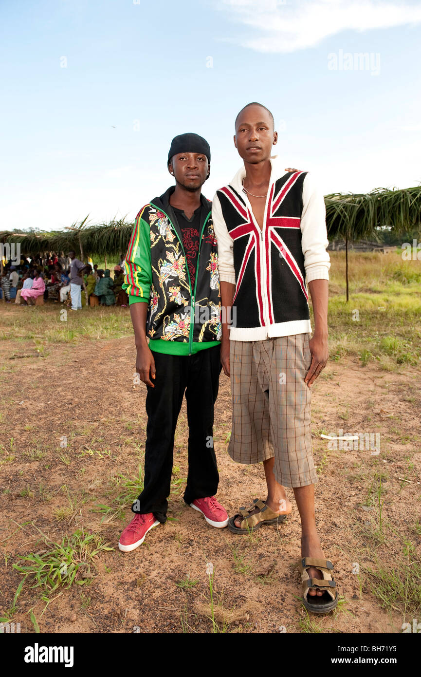 Two young men in fashionable clothes at village meeting Ngo town Sierra Leone Stock Photo