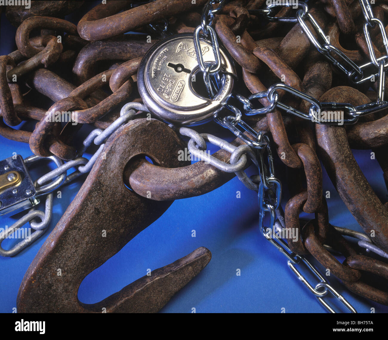 Lock and rusty chains as a symbol for security Stock Photo