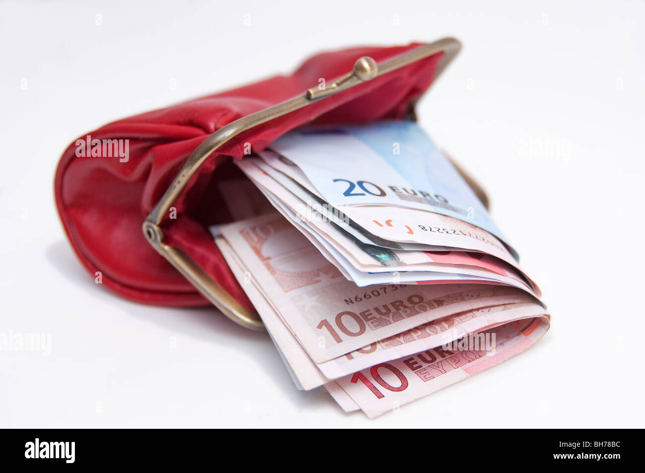Financial concept  red purse, Euro notes Stock Photo