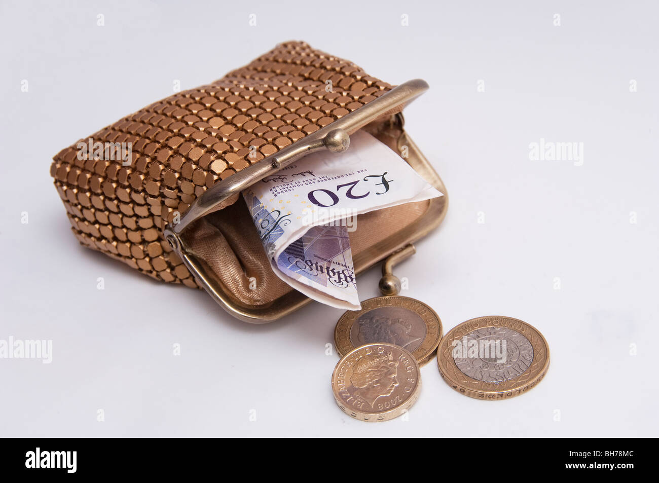 Financial concept  gold purse,  coins notes Stock Photo