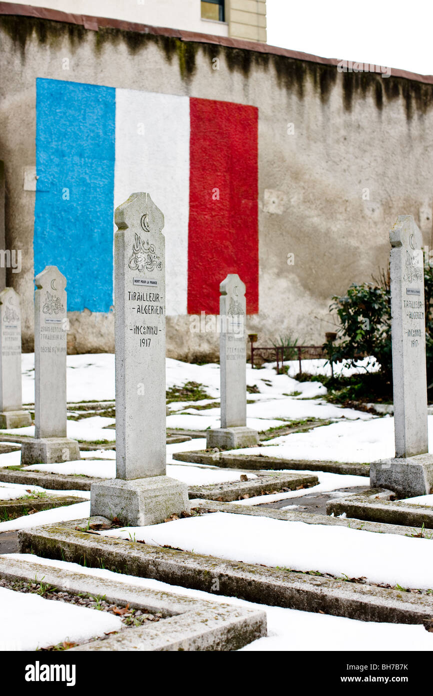 WWI  french algerian war graves with french flag in the background. Bellu Cemetery Bucharest Romania Stock Photo