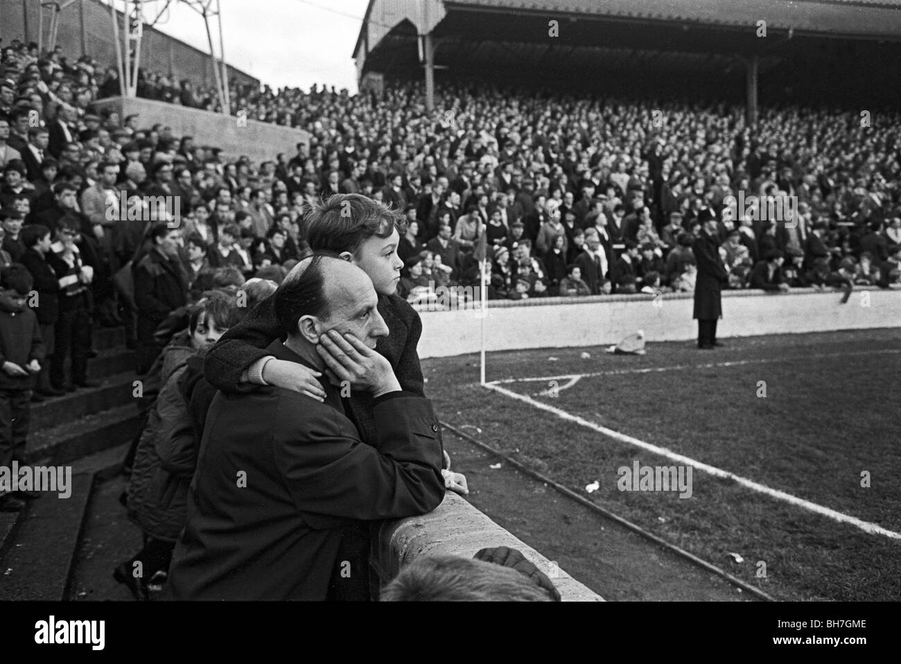 The crowd of fans at The Den that helped Millwall FC play 59 home games 1964-67 in a row without losses. Stock Photo