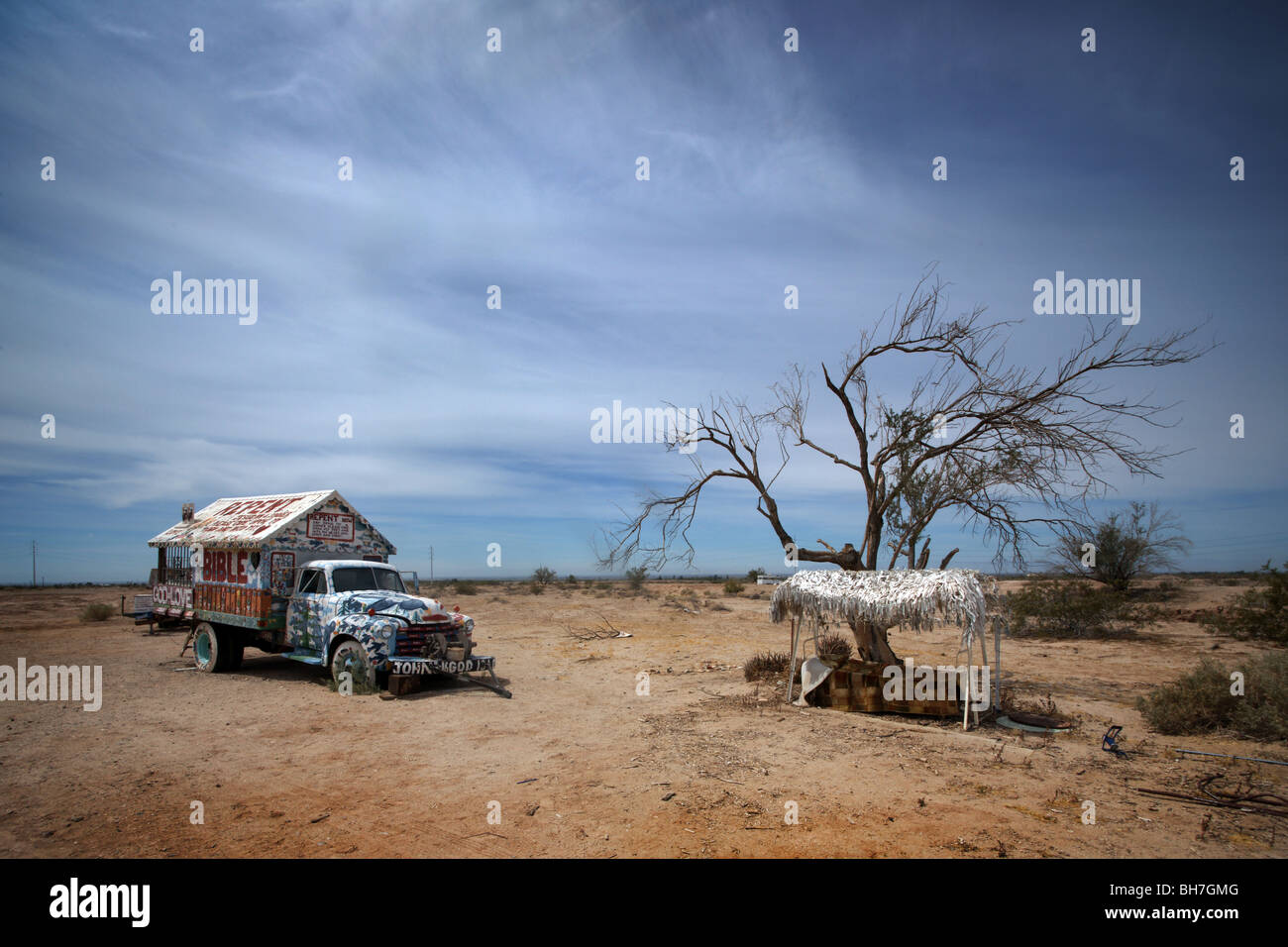 old truck and tree in desert Stock Photo - Alamy