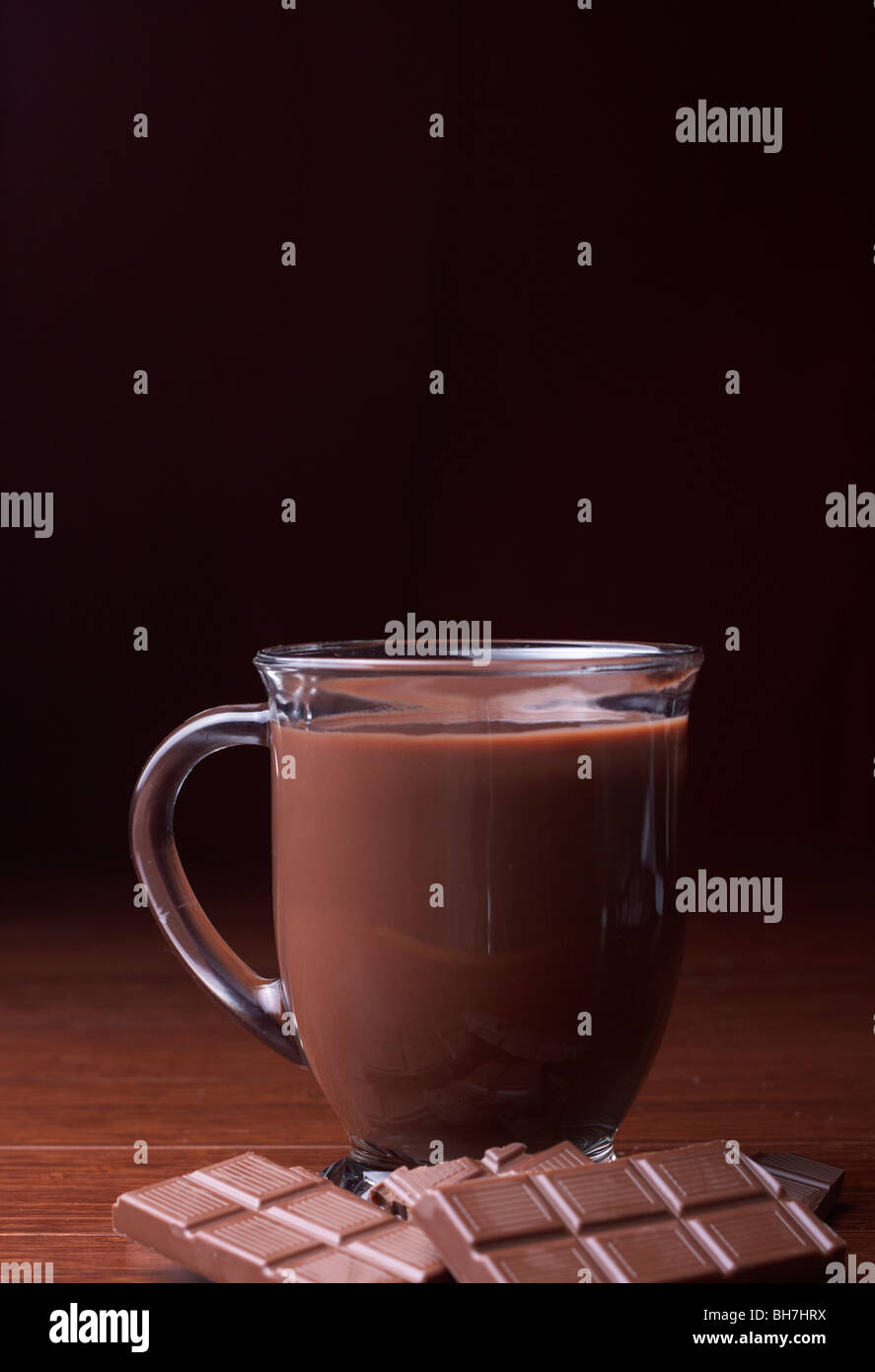 A mug of hot chocolate sits on a table. Stock Photo