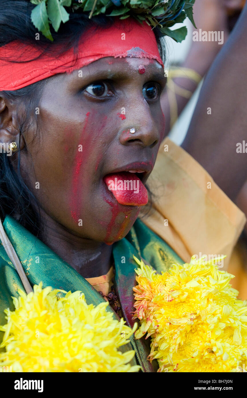 Pilgrims at thaipusam malaysia 2010 being posessed ,Thaipusam is a Hindu festival celebrated mostly by the Tamil community Stock Photo