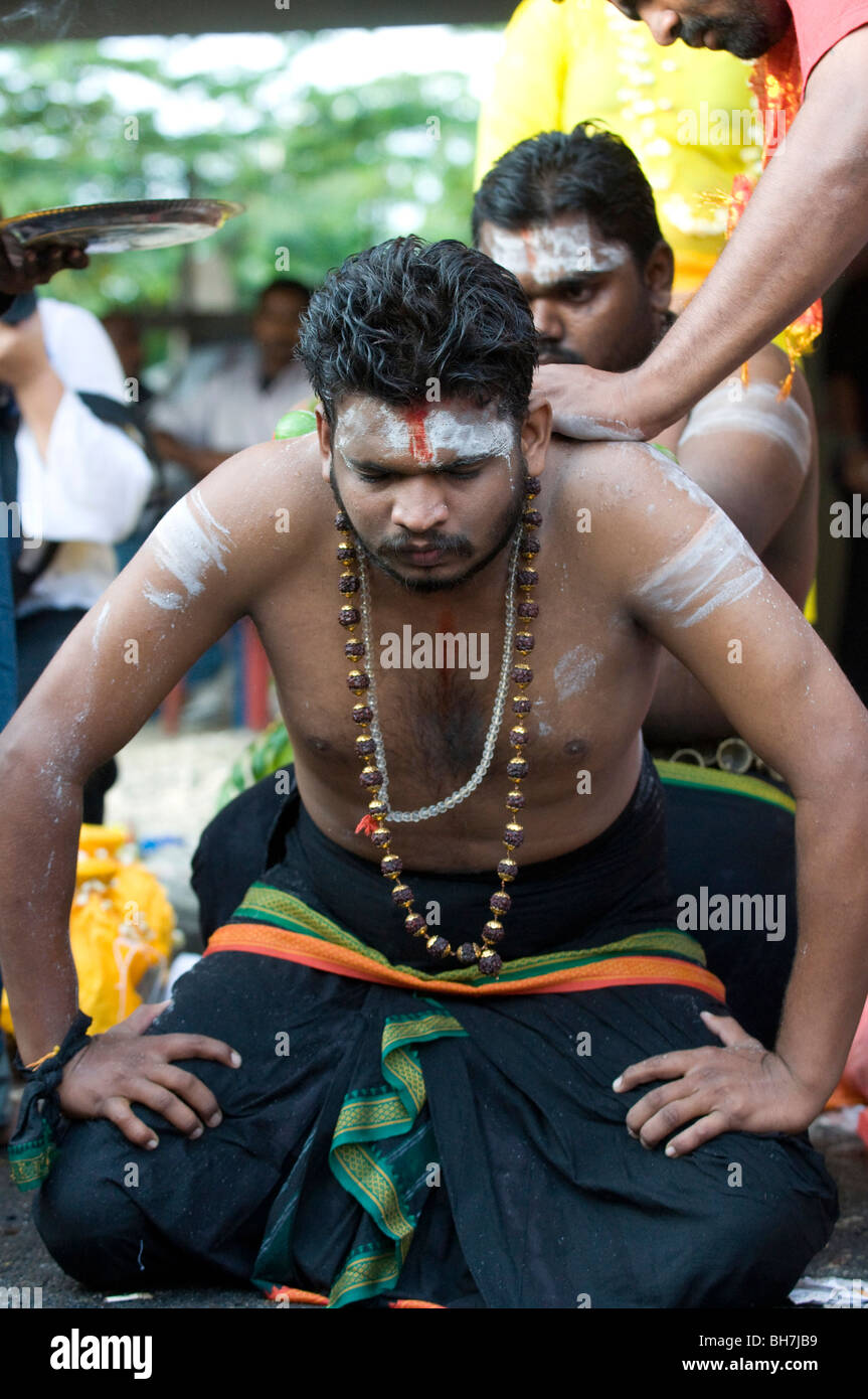 Pilgrims at thaipusam malaysia 2010 being posessed ,Thaipusam is a Hindu festival celebrated mostly by the Tamil community Stock Photo