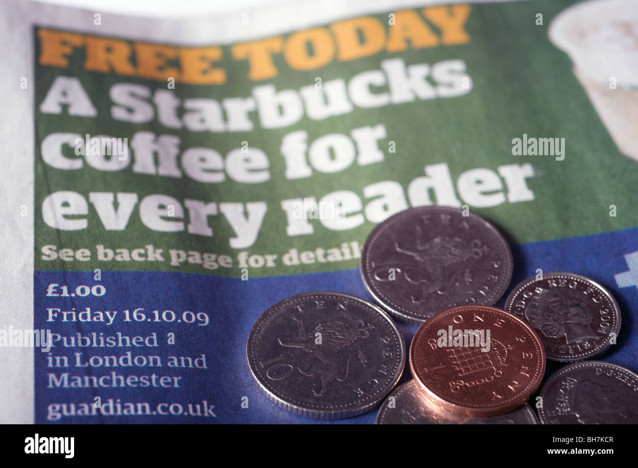 Guardian newspaper showing cover price and free Starbucks coffee for