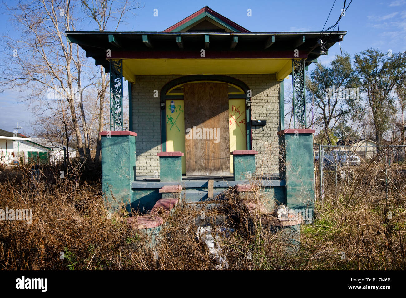 A home damaged by Hurricane Katrina, lower ninth ward, New Orleans, Louisiana. This style of house is called shotgun. Stock Photo