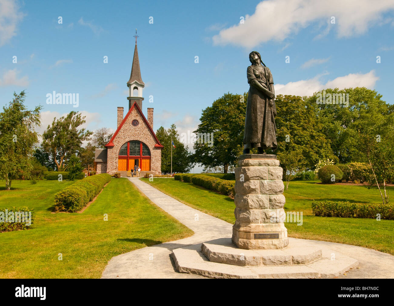 Nova Scotia, Wolfville, Grand Pre National Historic Site. Stone Chapel and Statue of Evangeline
