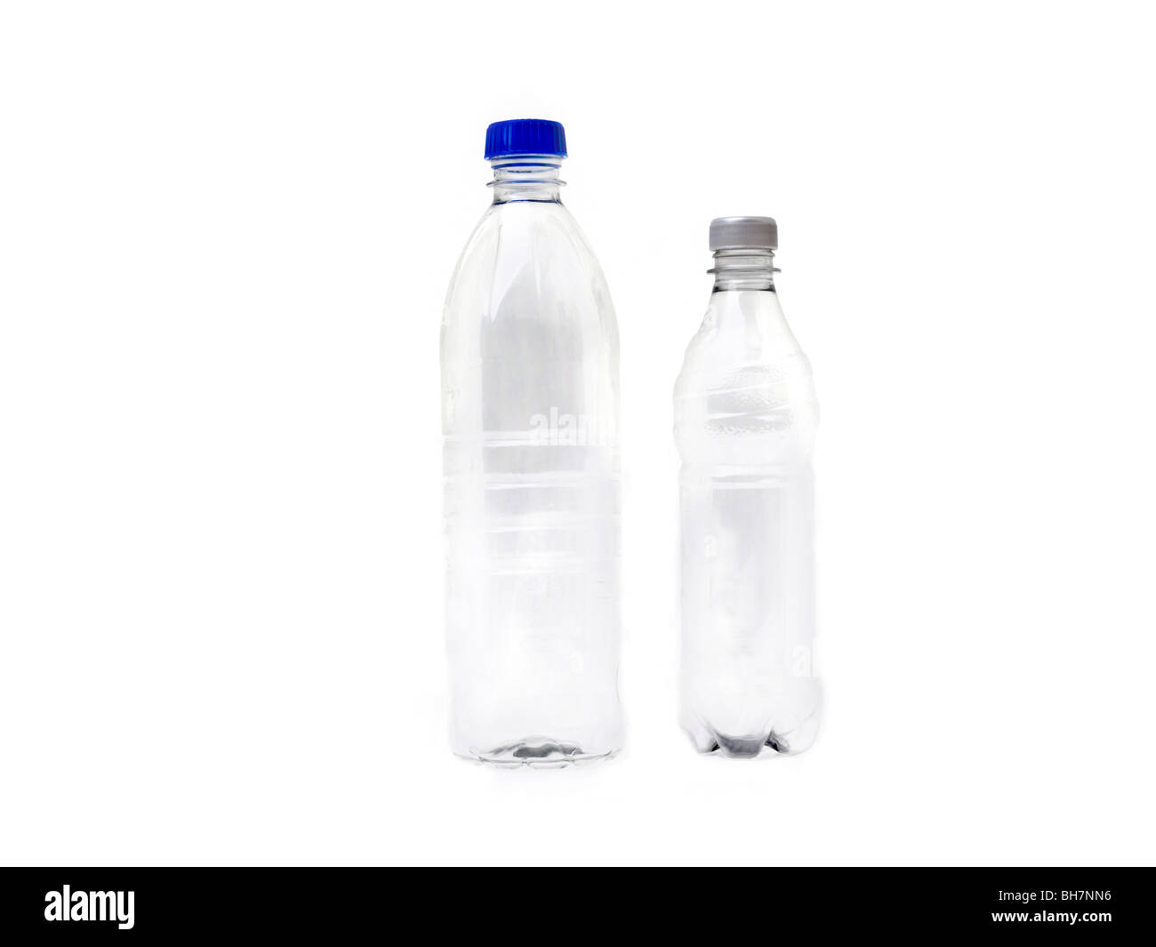 Two Plastic Drinks Bottles Small and Large Stock Photo - Alamy