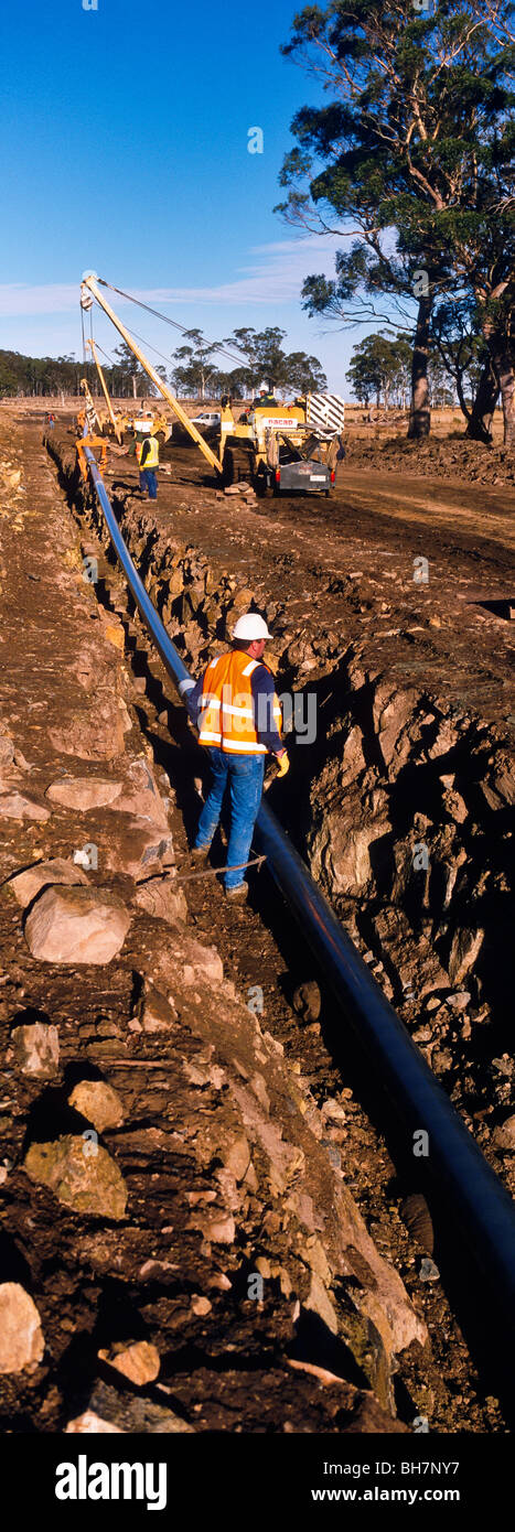 Laying gas pipeline Tasmania Australia Stock Photo