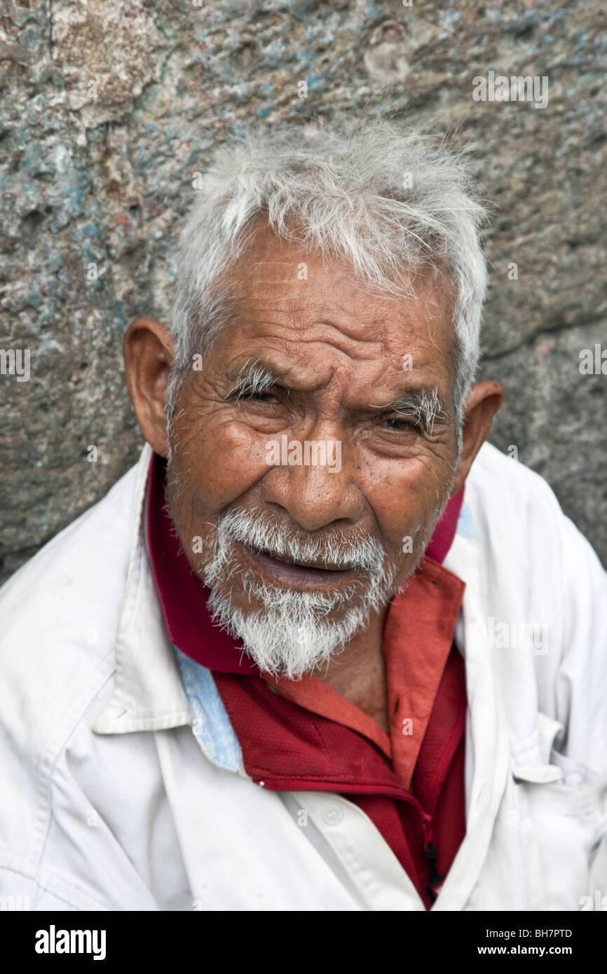 portrait of an old Mexican man with deeply furrowed brow, white hair &  goatee & quizzical expression Oaxaca City Mexico Stock Photo - Alamy