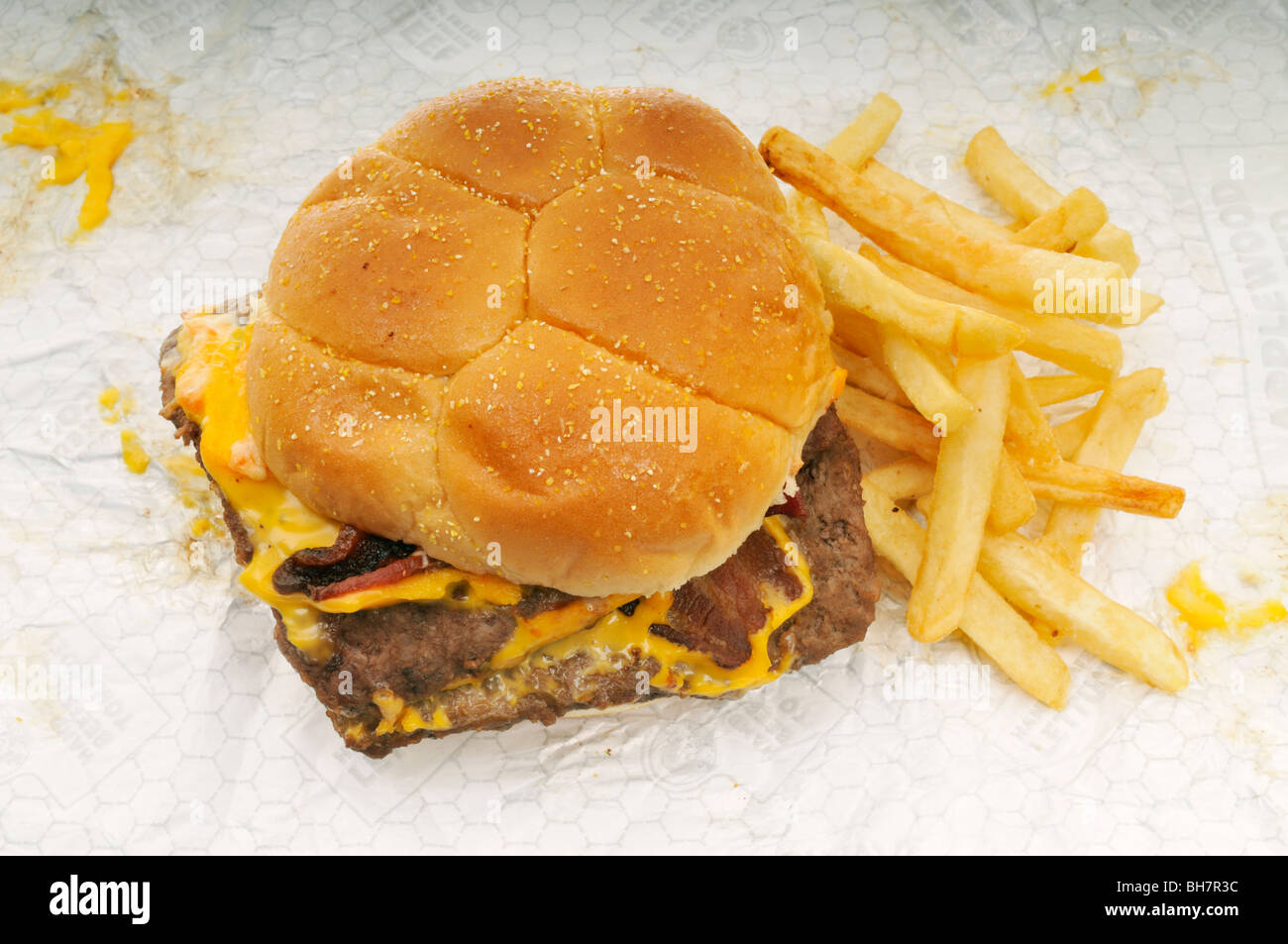Wendy's bacon double cheeseburger with french fries on wrapper Stock Photo