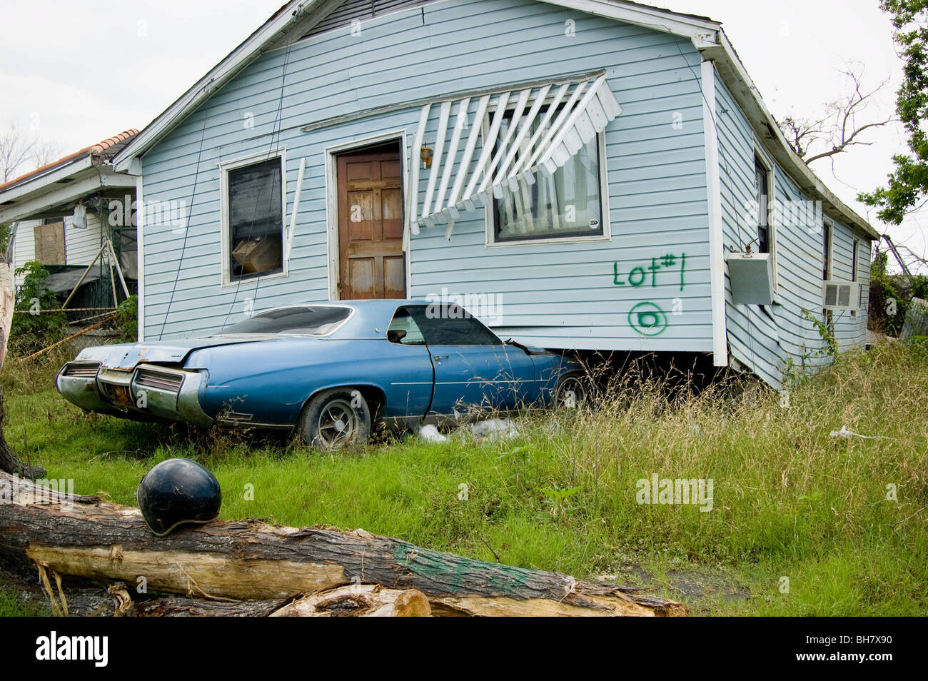 A home sits atop a car in the Lower Ninth Ward, New Orleans Stock Photo