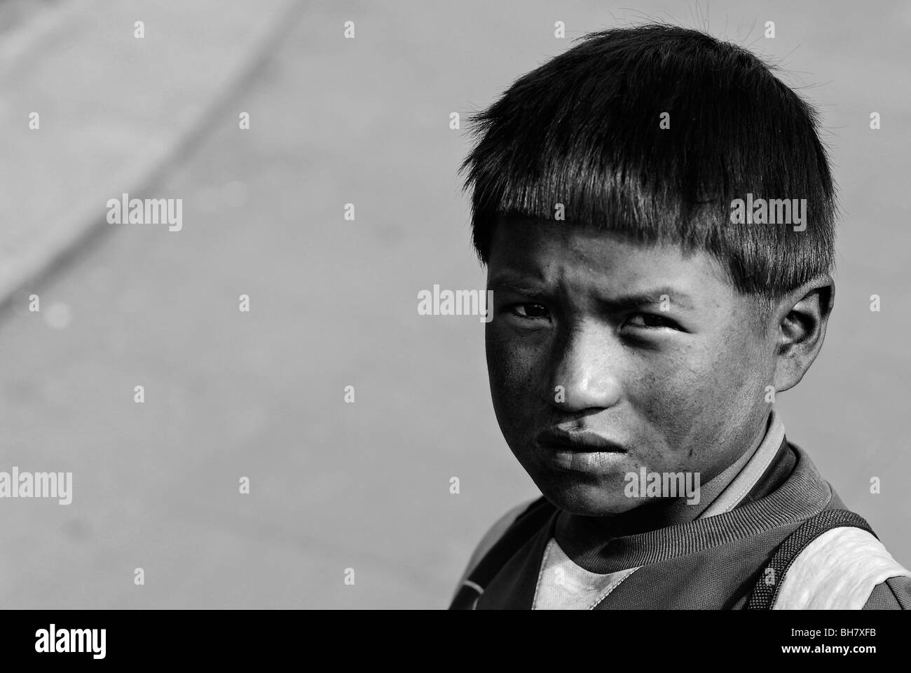 Ecuador, Quito, portrait of unhappy boy with a messy face Stock Photo
