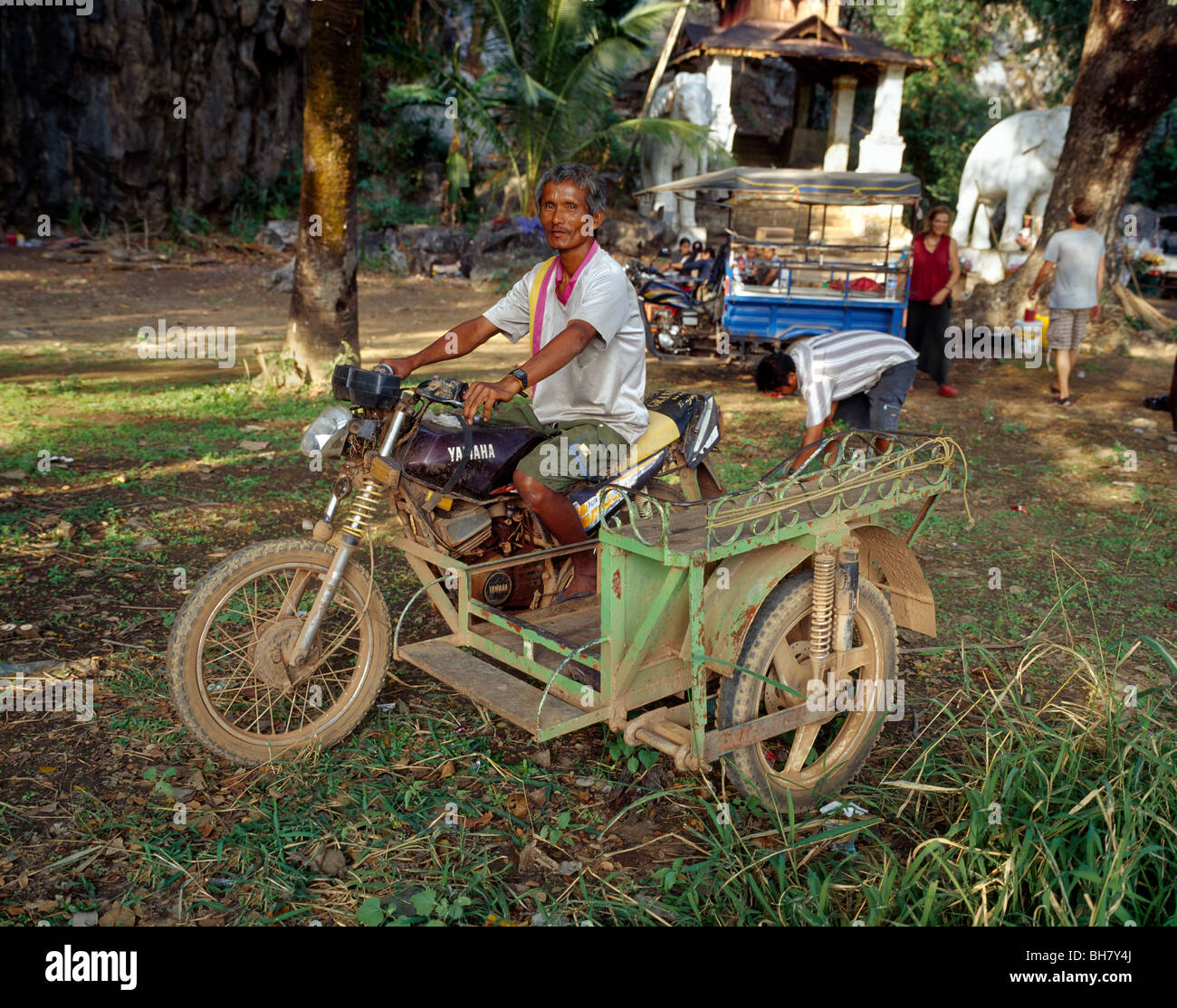 Driver on his motobike in front of Saddar Cave near Hpa-an Karen Kayin State Myanmar Burma Stock Photo