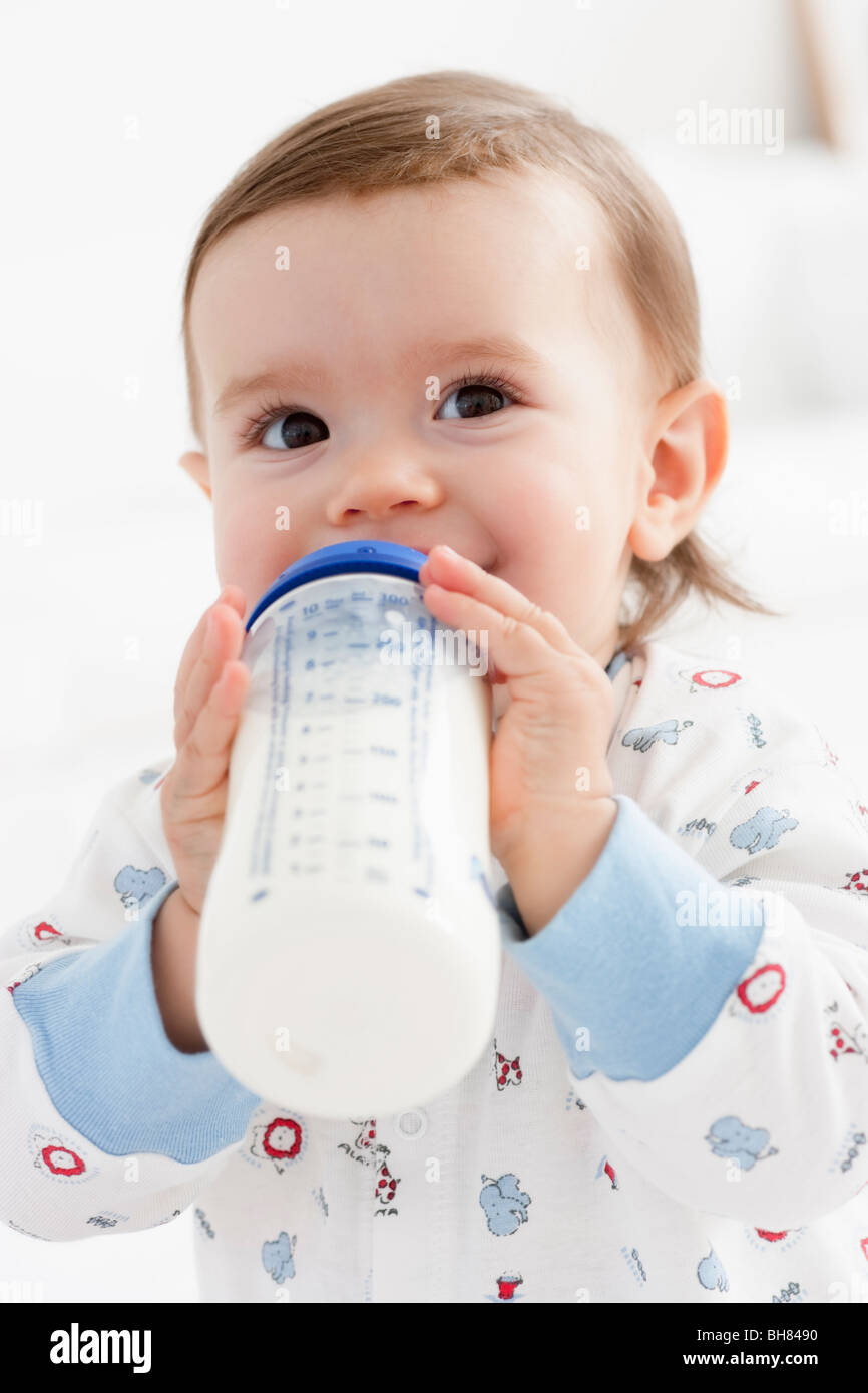 baby girl drinking milk Stock Photo Alamy
