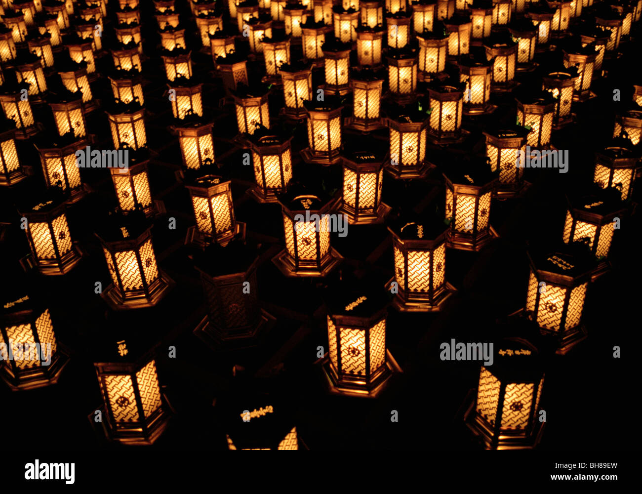 Illuminated lanterns arranged in rows, Miyajima, Japan Stock Photo