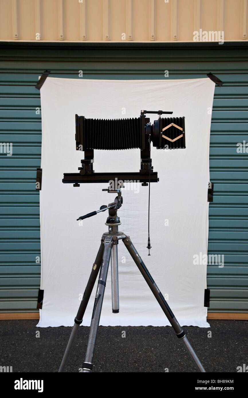 A old-fashioned camera and back drop set up for a photo shoot Stock Photo